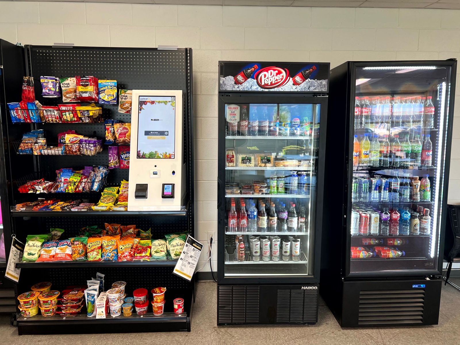 Micro market cooler stocked with cold drinks
